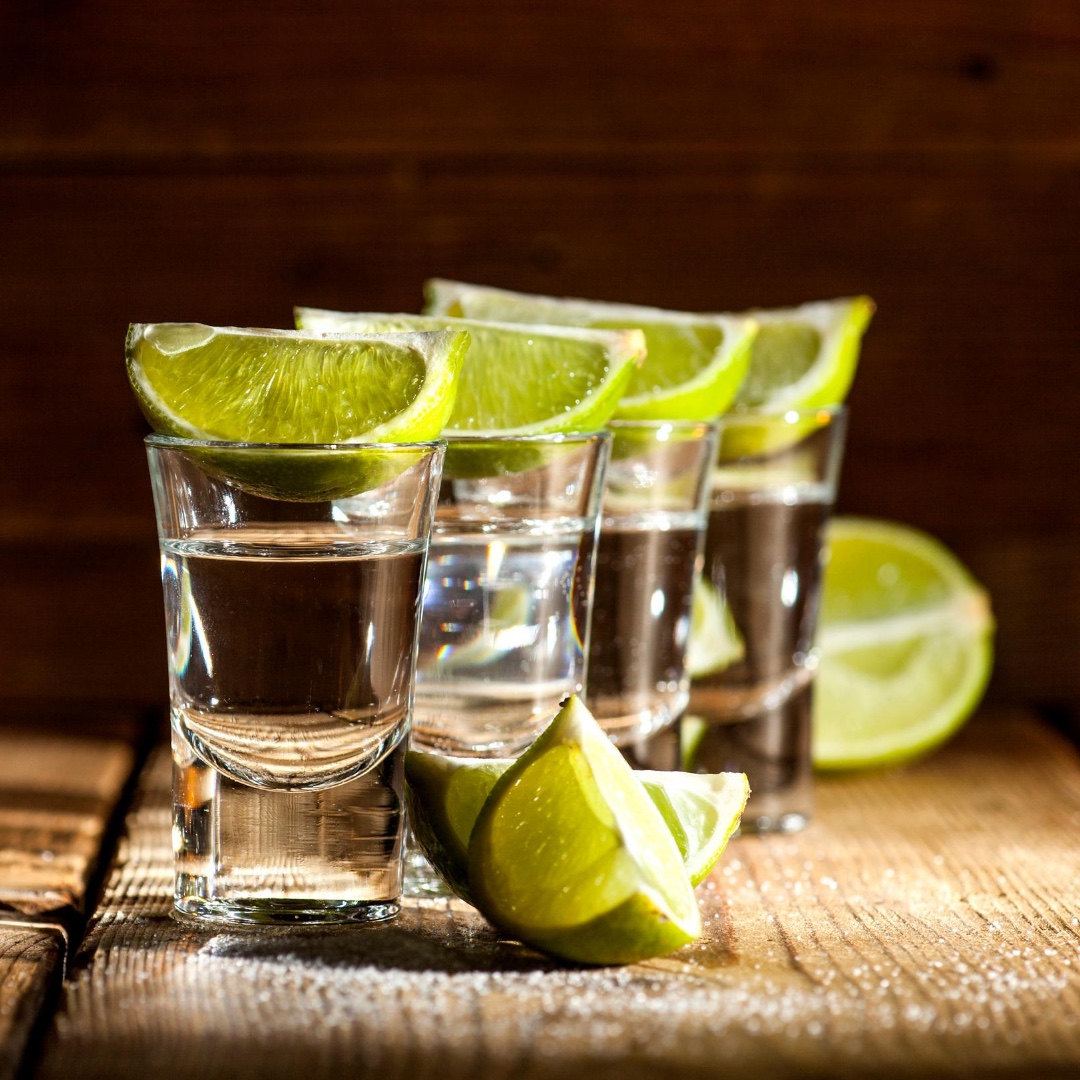 Tropical tequila shots with lime